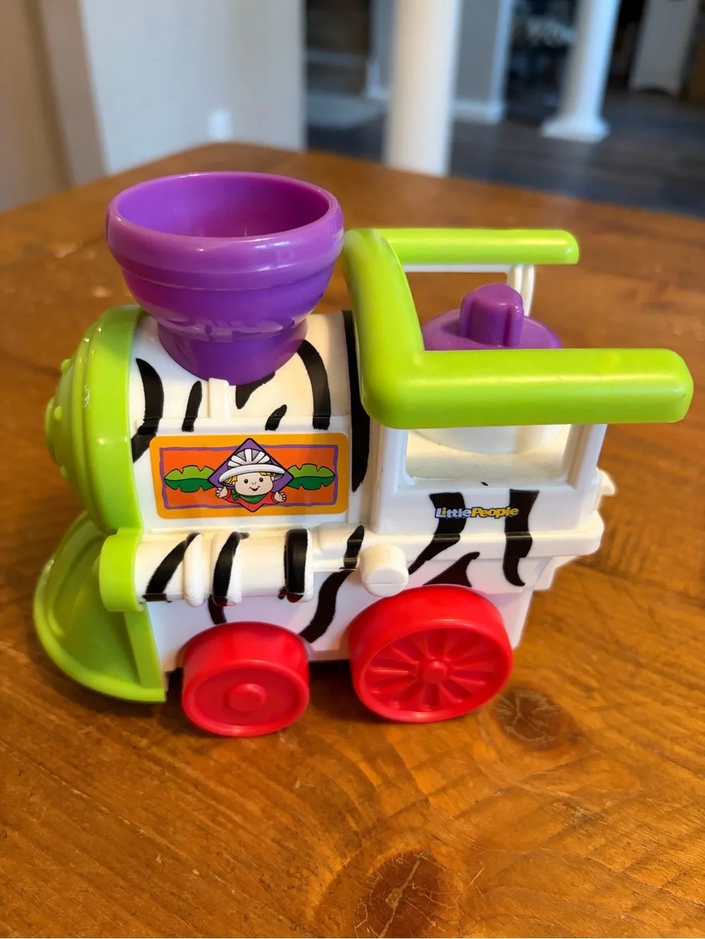 Fisher Price Little People musical zoo/safari train engine as is. Works